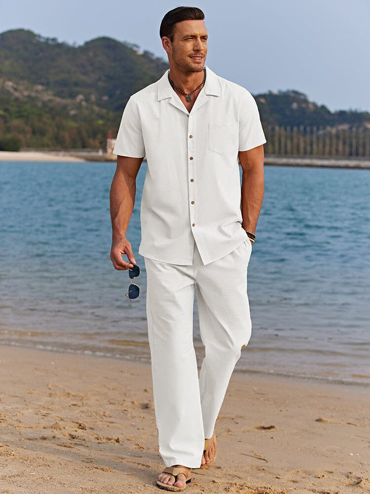 Detail of men's resort wear set showing camp collar shirt and side pocket pants