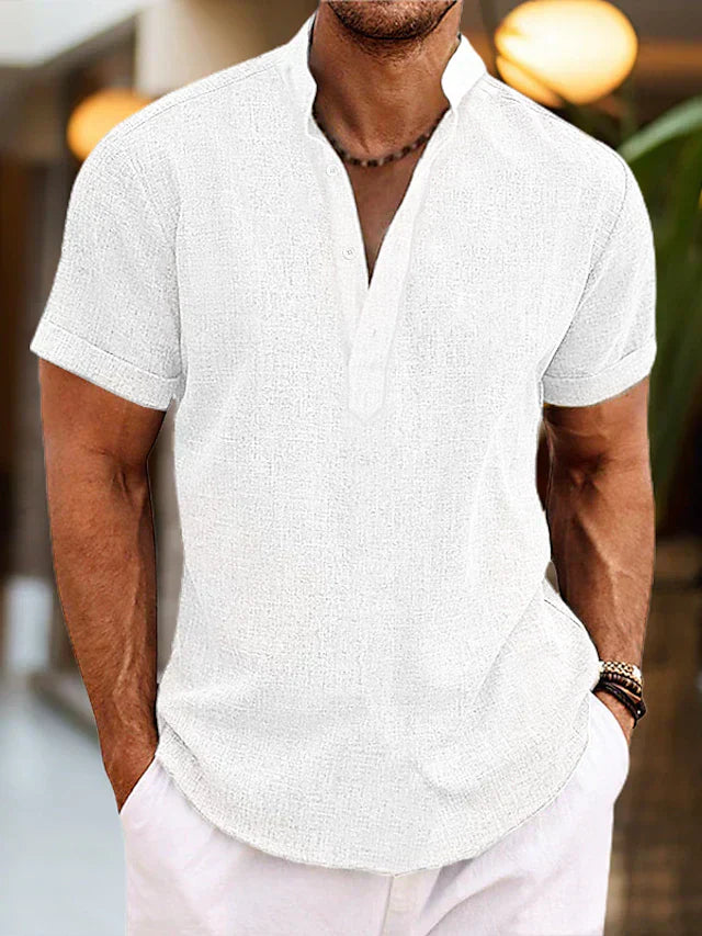 Close-up view of men's henley shirt showing button placket detail and woven texture