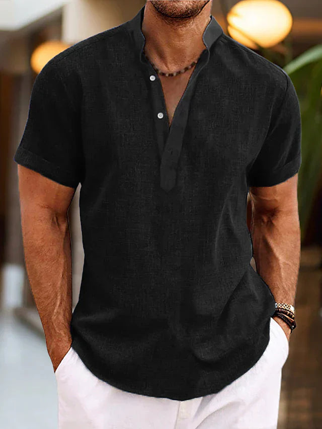 Side angle of men's short sleeve henley with relaxed fit and curved hem