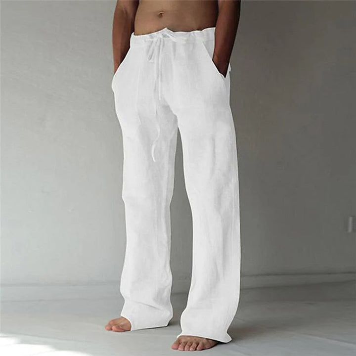 Men's relaxed wide-leg pants in white with drawstring waist and side pockets for casual wear