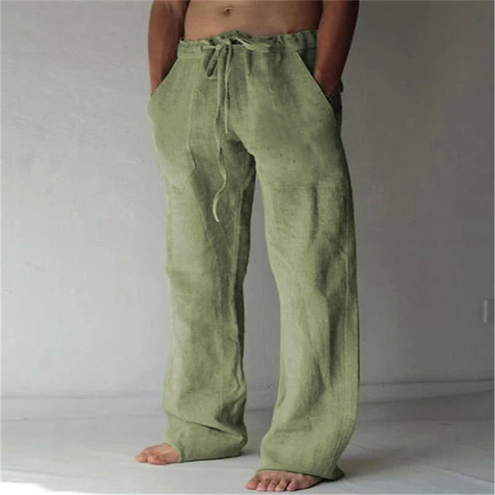 Back view of men's white wide-leg pants showing straight-leg silhouette and relaxed fit