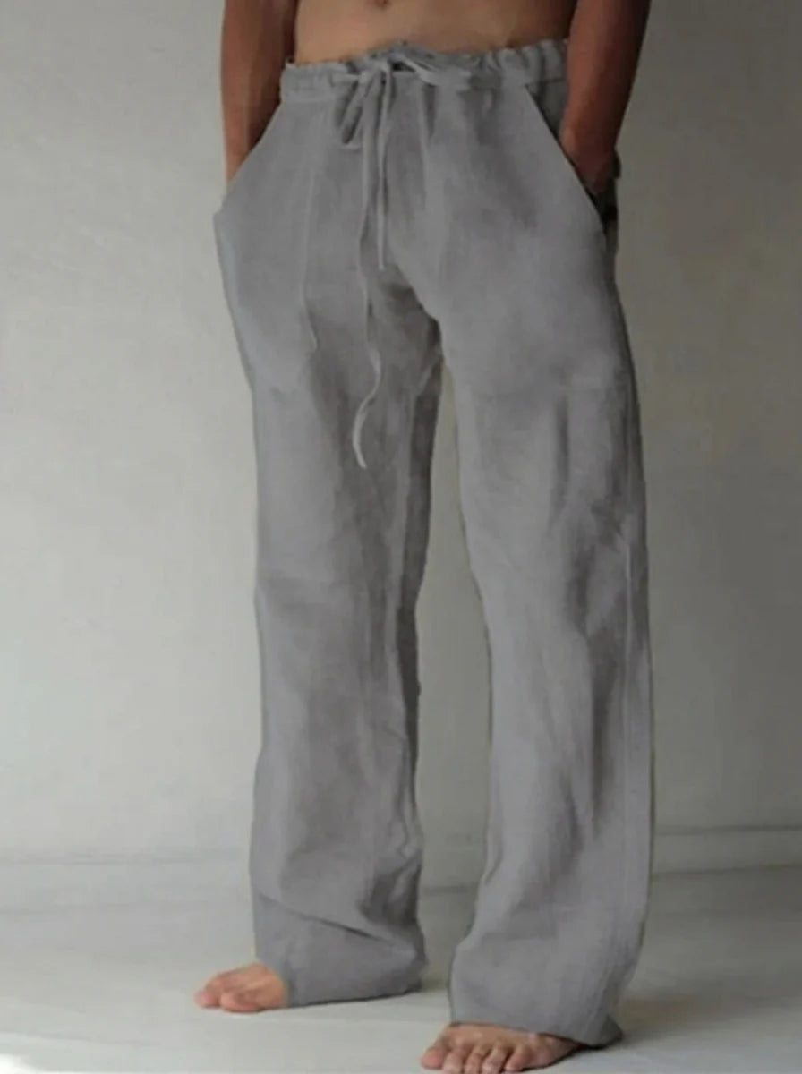 Close-up of men's relaxed fit pants with elastic waistband and clean finish for casual styling