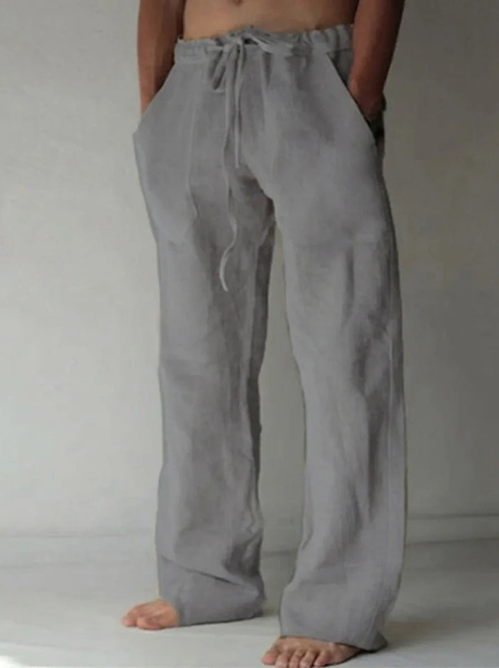 Close-up of men's relaxed fit pants with elastic waistband and clean finish for casual styling
