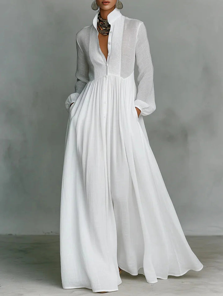 Kennedy Button-Front Maxi Dress in white with long sleeves, stand collar, and flowing ankle-length skirt for women