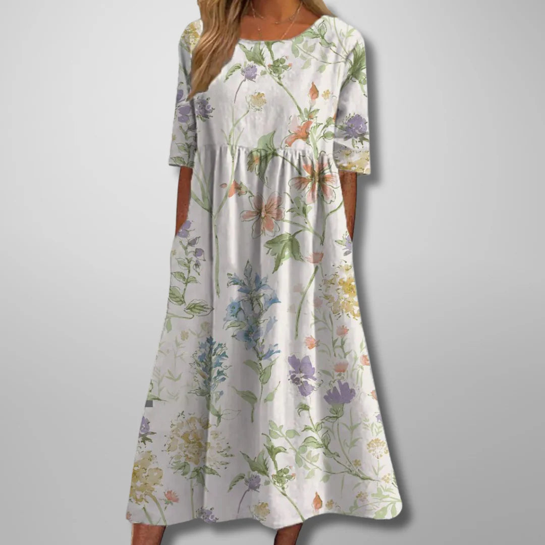 Navy blue midi dress with white floral pattern and comfortable breathable fabric construction