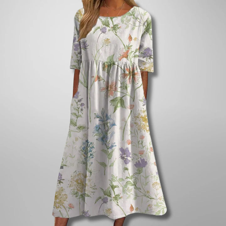Navy blue midi dress with white floral pattern and comfortable breathable fabric construction