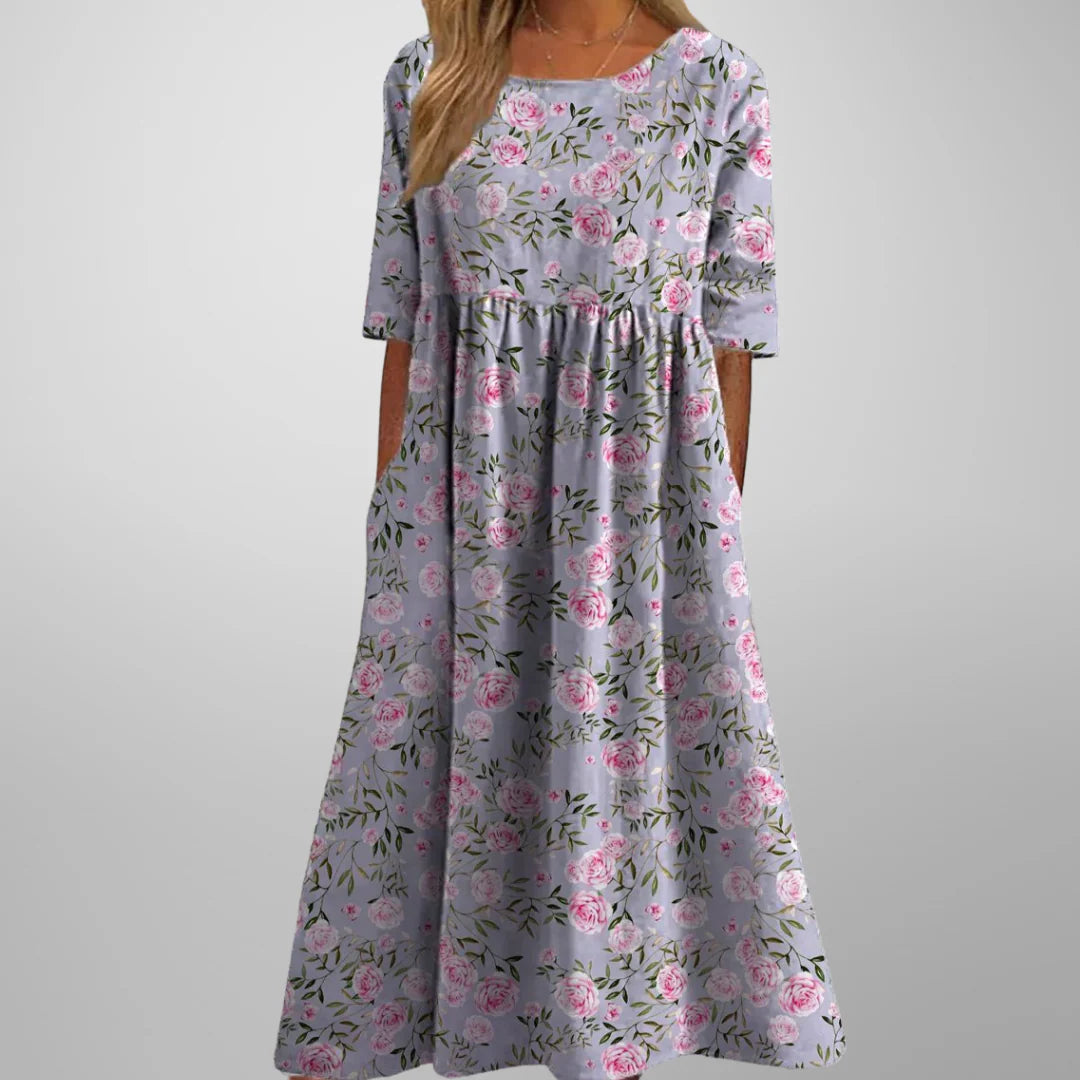 Floral embroidered midi dress in lightweight fabric with elbow-length sleeves and relaxed fit