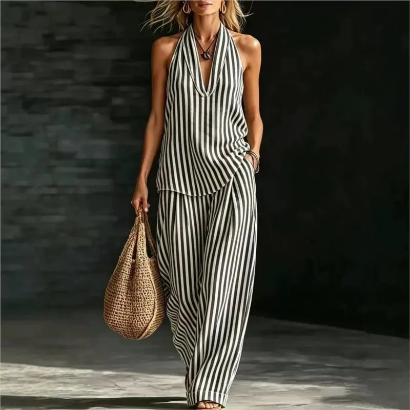 Women's striped halter top and wide leg pants set in black and white vertical stripes