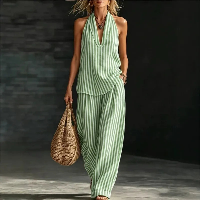 Side view of two piece striped set showing wide leg pants and halter neckline detail