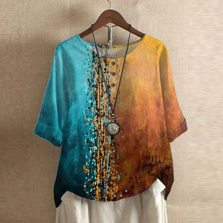 Back view of relaxed fit floral blouse showing flowing silhouette and short sleeves
