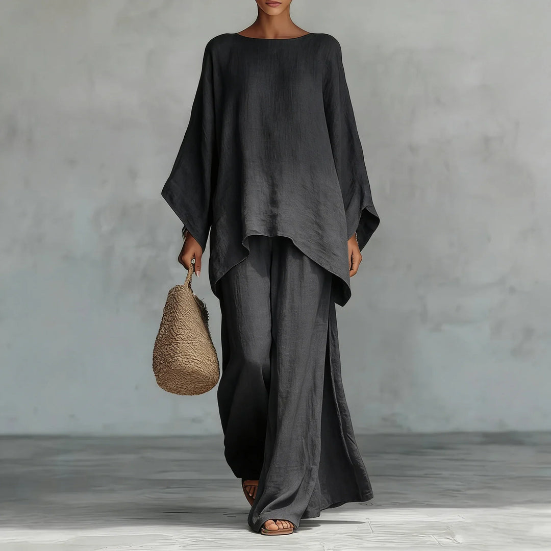 Close up of oversized linen top with boat neckline and soft fabric texture