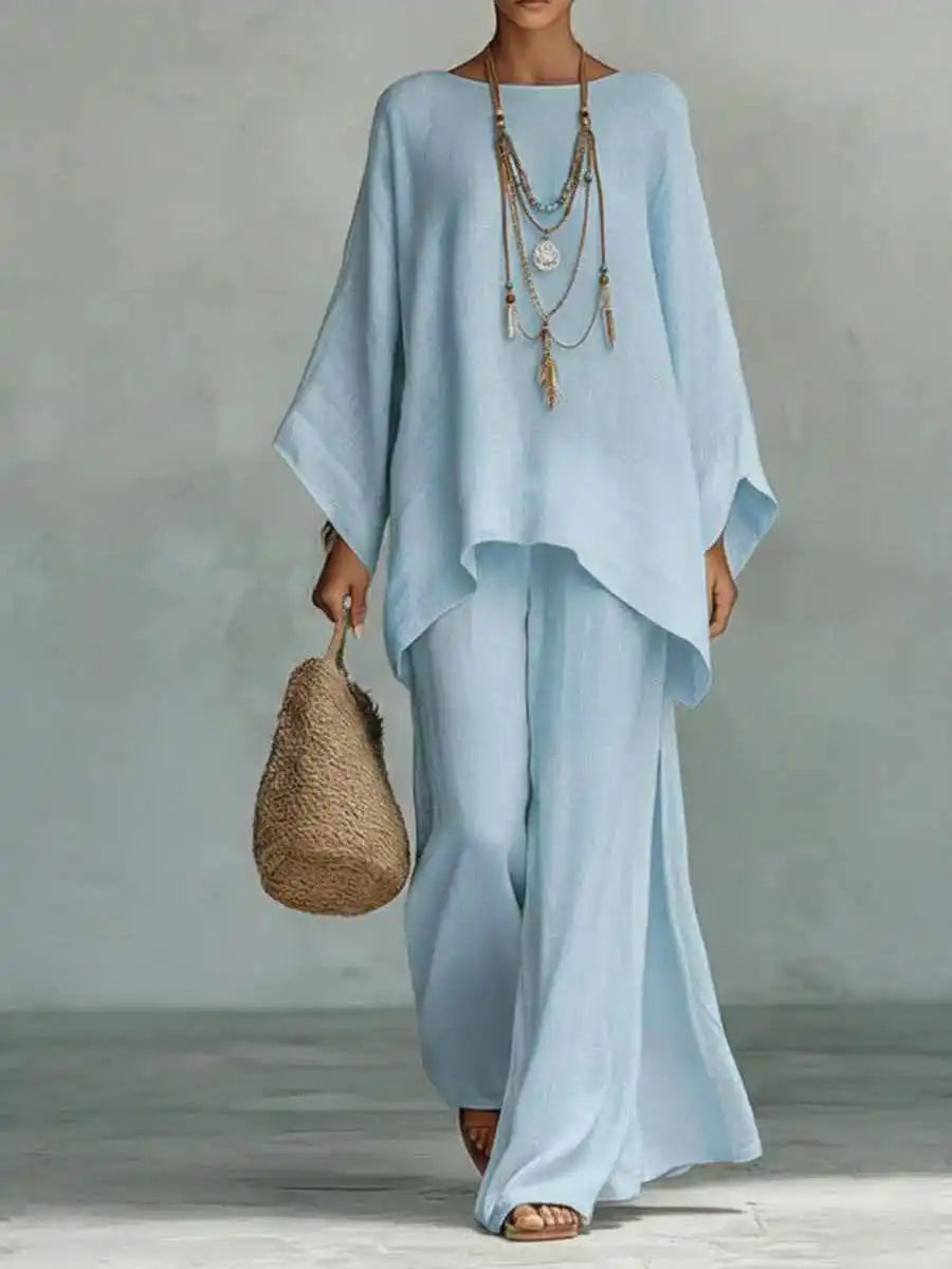 Back view of flowing linen two piece set with wide sleeves and loose fit pants