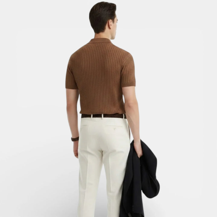 Detail shot of men's ribbed knit polo highlighting textured surface and sleeve cuffs