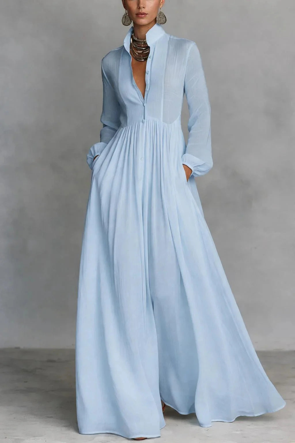 Flowing Button-Front Maxi Dress in light blue with collared neckline, long sleeves, and gathered waist