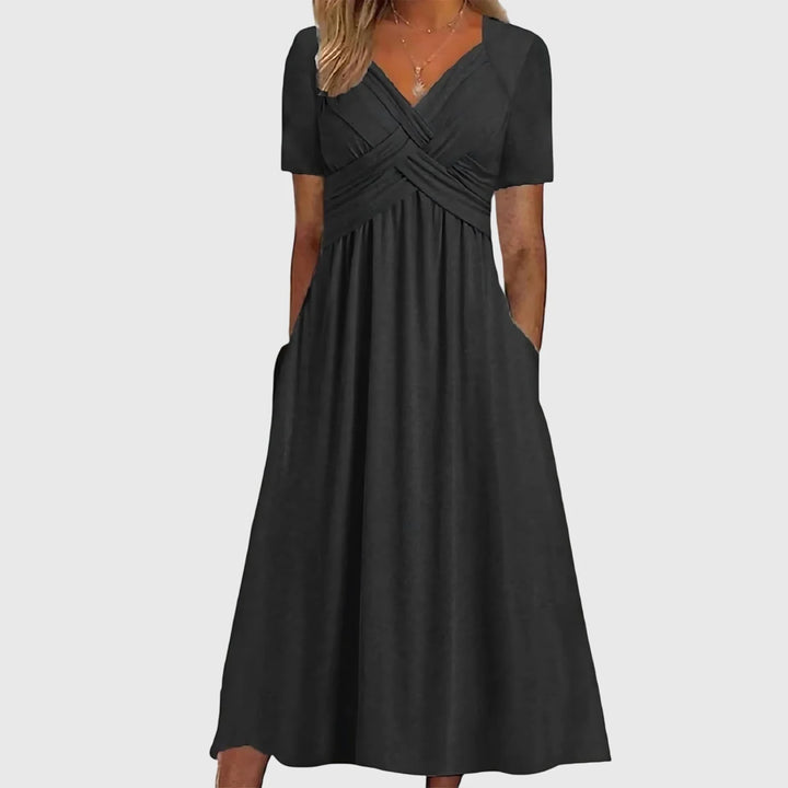 Front view of midi dress with tummy control showing A-line silhouette and short sleeves