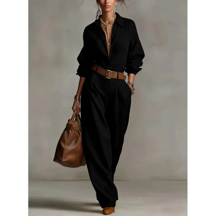 Woman styling a two-piece lounge set with a brown belt and leather accessories