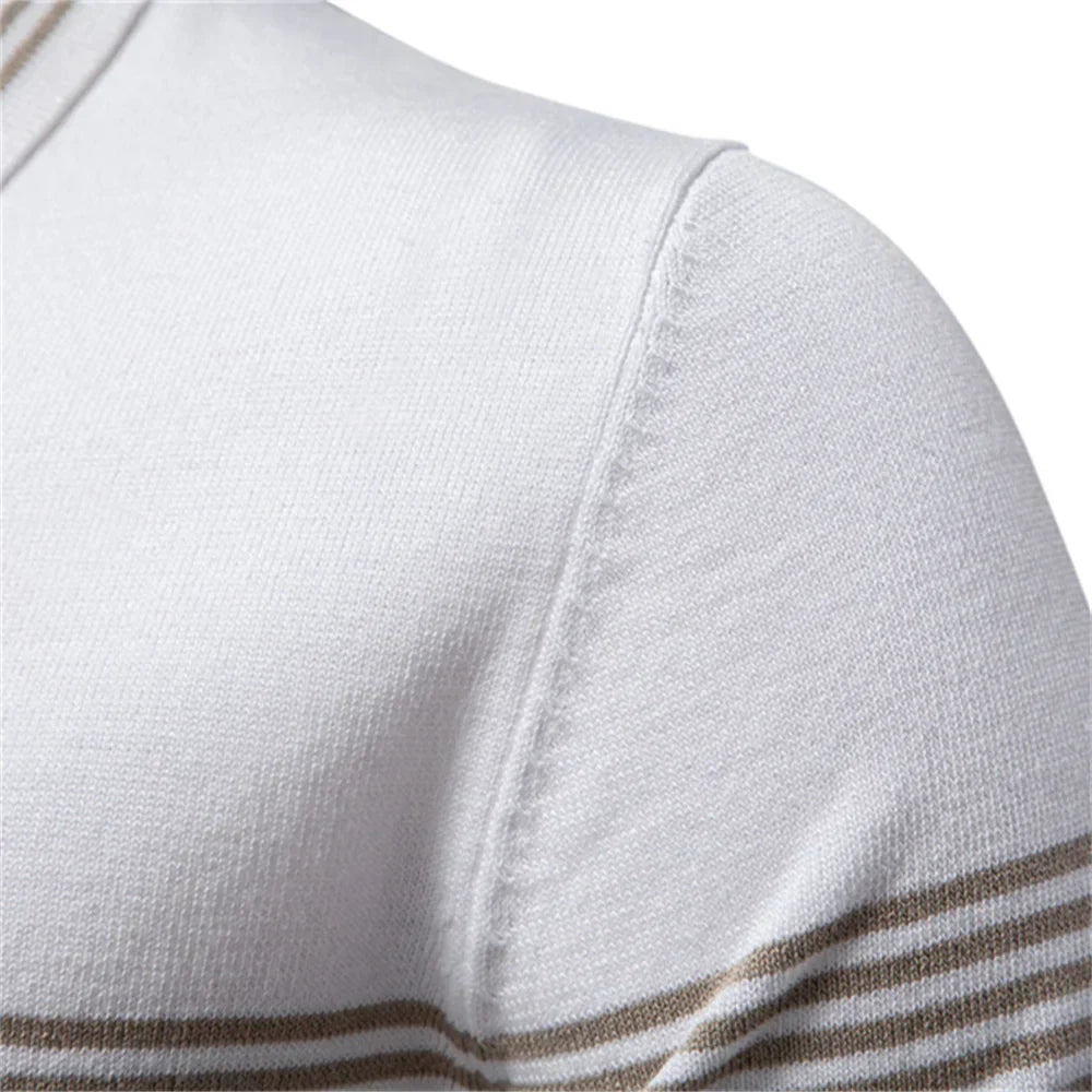 Back view of men's short-sleeve zip polo with ribbed bottom hem and slim fit silhouette
