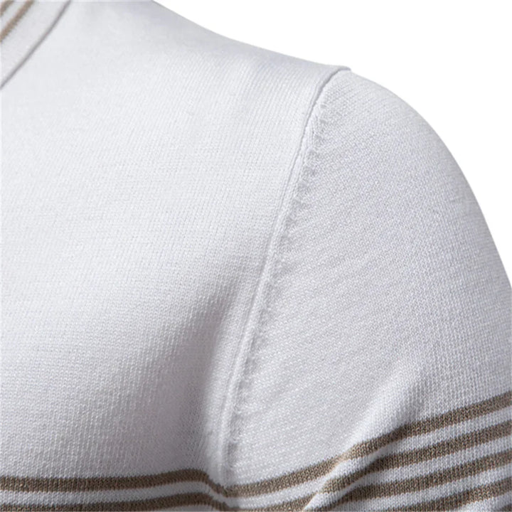 Back view of men's short-sleeve zip polo with ribbed bottom hem and slim fit silhouette