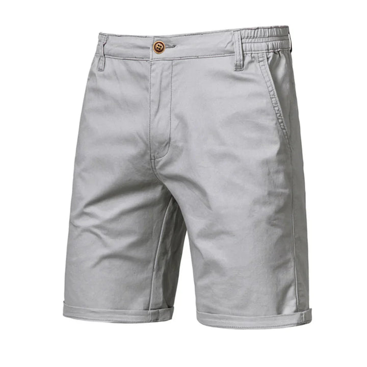 Men's navy chino shorts with rolled hem detail for versatile warm-weather styling