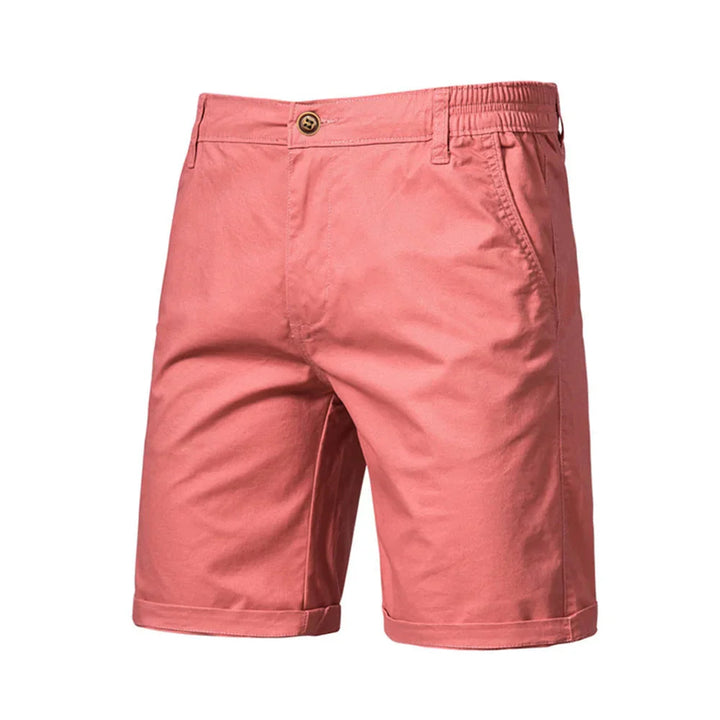 Side angle of men's cuffed chino shorts with smooth woven fabric and relaxed silhouette