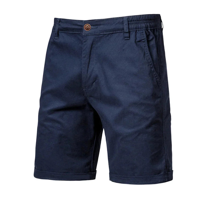 Detail shot of rolled cuff hem on men's chino shorts with belt loops at waistband