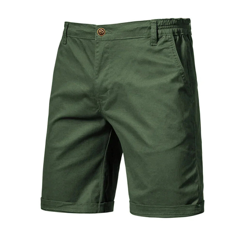 Full-length view of men's cuffed chino shorts with smooth fabric finish and modern cut