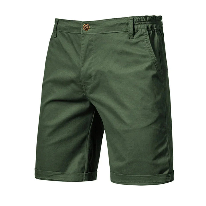 Full-length view of men's cuffed chino shorts with smooth fabric finish and modern cut