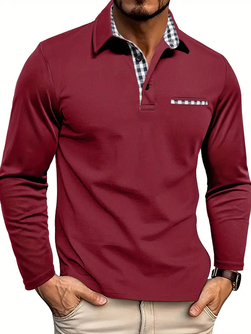 Close-up view of men's polo shirt showing contrast collar with patterned inner trim and chest pocket