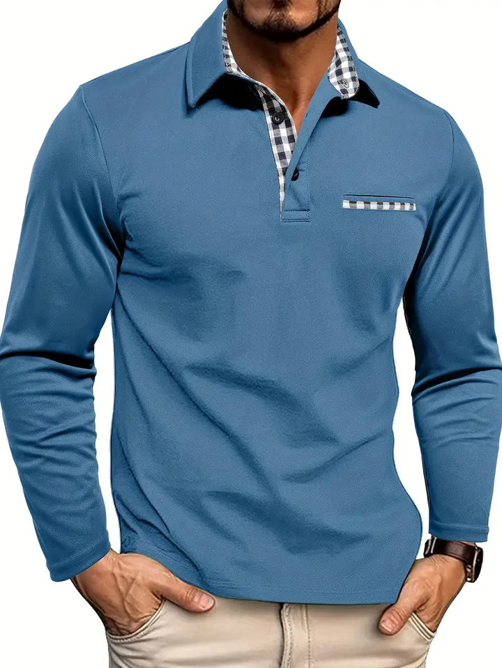 Detail shot of zip placket and gingham-patterned collar trim on men's polo shirt