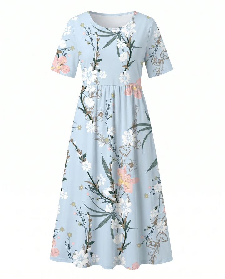 Full-length view of floral midi dress paired with neutral sandals for casual summer styling