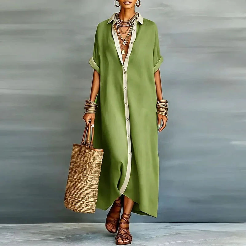 Detail shot of turn-down collar and short sleeve construction on maxi shirt dress