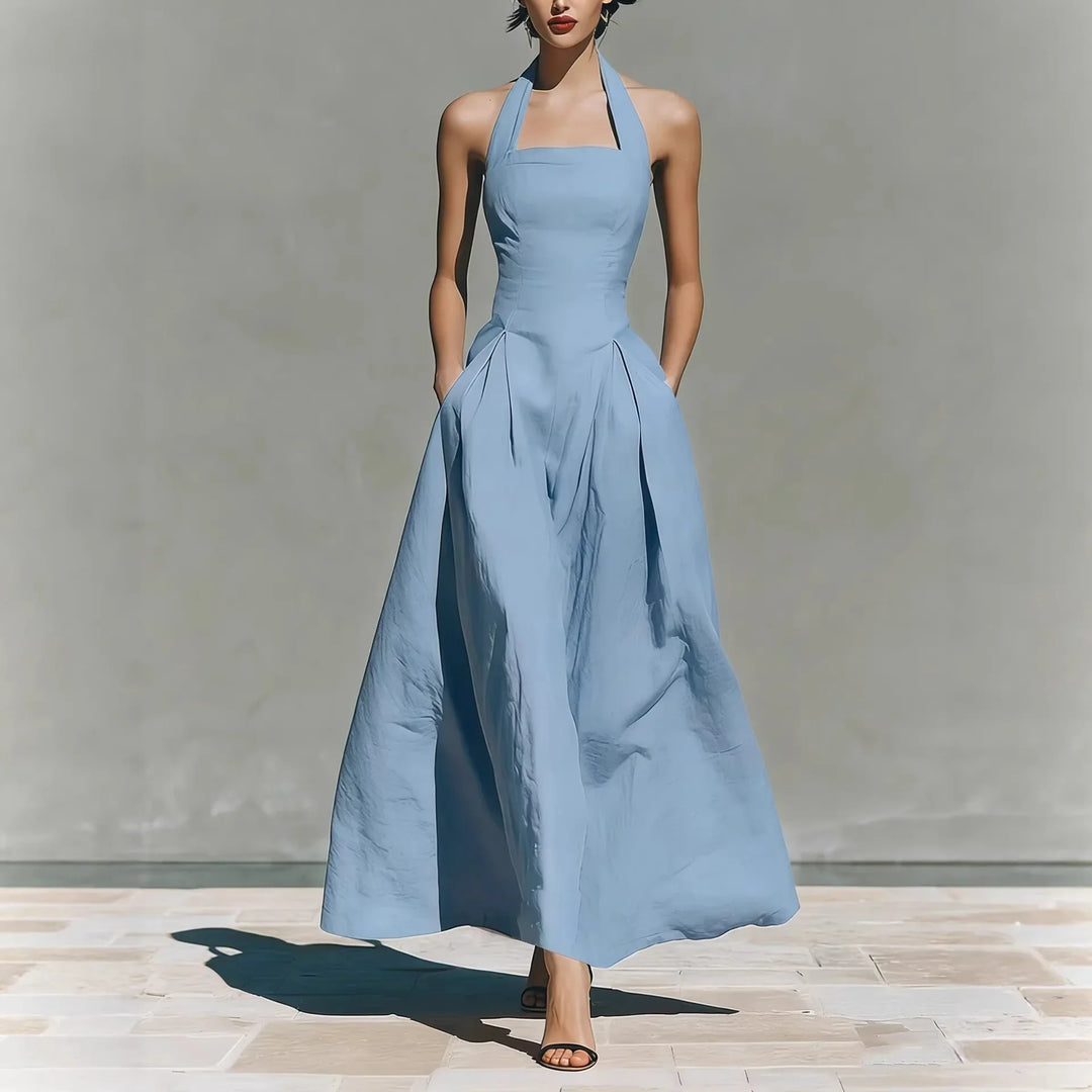 Sky blue halter maxi dress with a-line skirt and structured bodice on model
