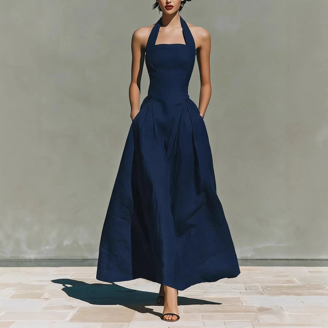 Close-up of halter neckline and fitted bodice construction on maxi dress
