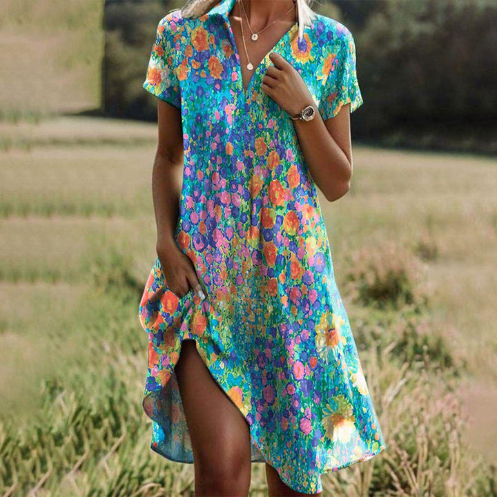 Detail of polka dot midi dress hem showing knee-length cut and fabric movement