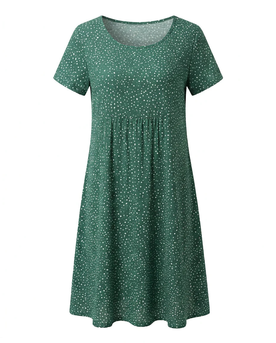 Back view of polka dot midi dress showing relaxed fit and short sleeve design