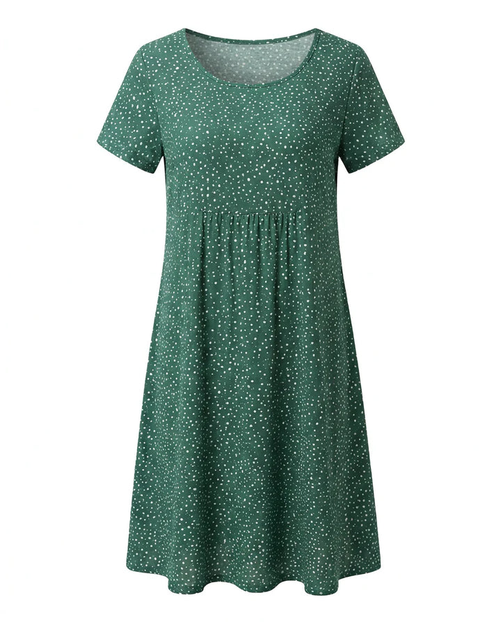 Back view of polka dot midi dress showing relaxed fit and short sleeve design