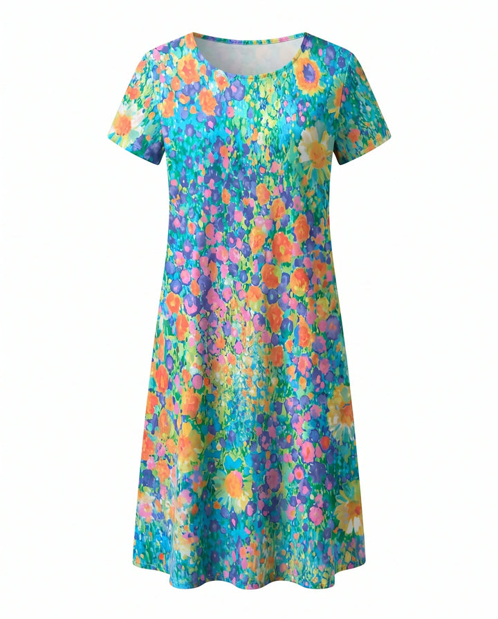 Woman wearing polka dot midi dress in natural outdoor light showing true teal color