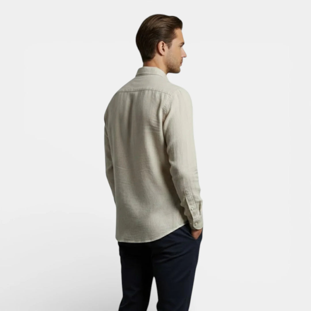 Side view of men's long sleeve shirt showing relaxed fit and sleeve length