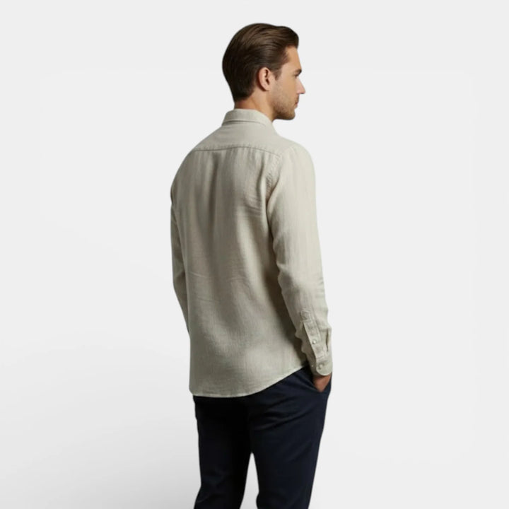 Side view of men's long sleeve shirt showing relaxed fit and sleeve length