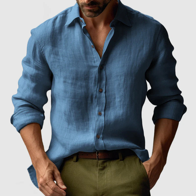 Side angle of men's casual button front shirt with relaxed fit and rolled sleeves