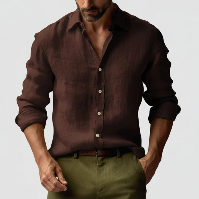 Men's woven shirt in yellow paired with olive pants and brown loafers for casual outfit