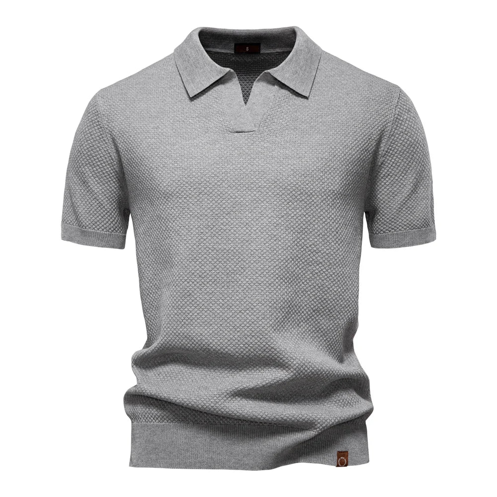 Men's short-sleeve knit polo shirt textured solid design in light gray with split neckline and ribbed hem