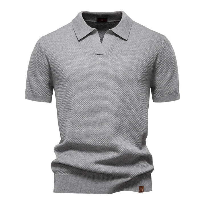 Men's short-sleeve knit polo shirt textured solid design in light gray with split neckline and ribbed hem