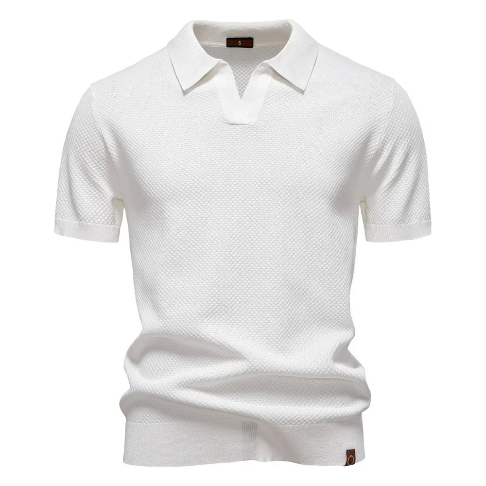 Close-up of ribbed collar and split neckline on men's knit polo shirt