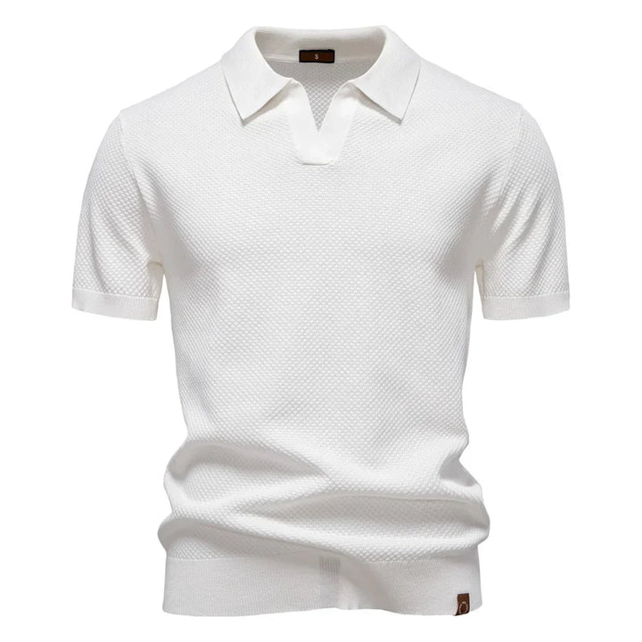Close-up of ribbed collar and split neckline on men's knit polo shirt