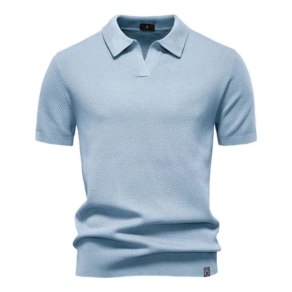 Men's short-sleeve knit polo shirt textured solid design in navy blue colorway