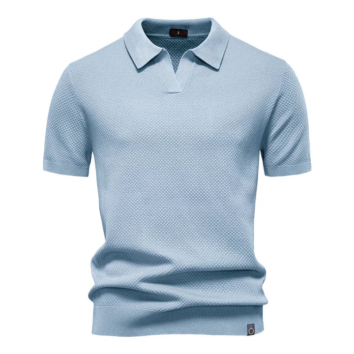 Men's short-sleeve knit polo shirt textured solid design in navy blue colorway
