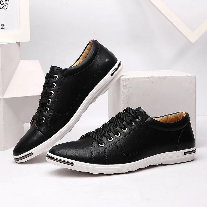 Side view of men's casual low-top sneakers showing clean silhouette and flat rubber sole