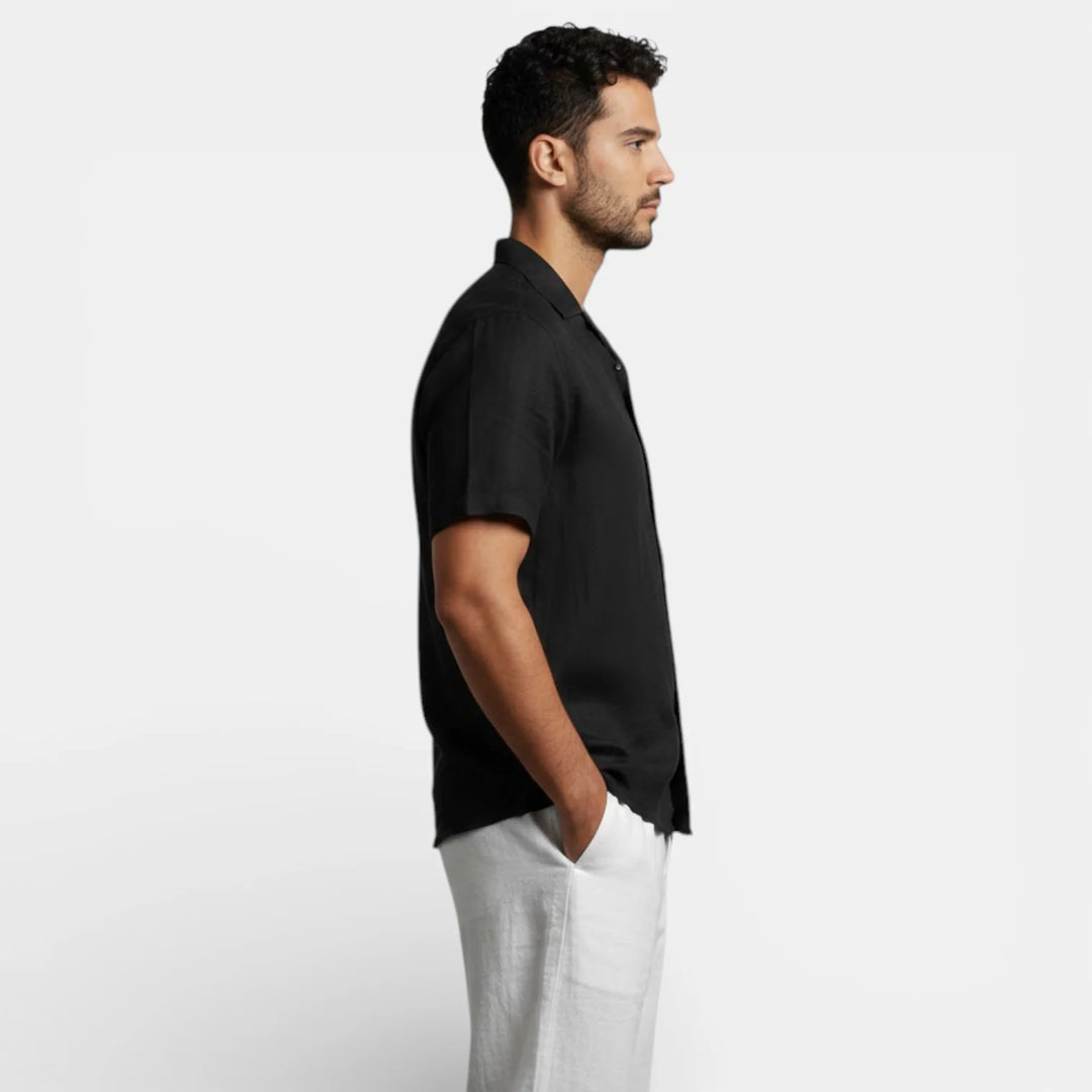 Side view of men's black button-up shirt with short sleeves and classic collar design