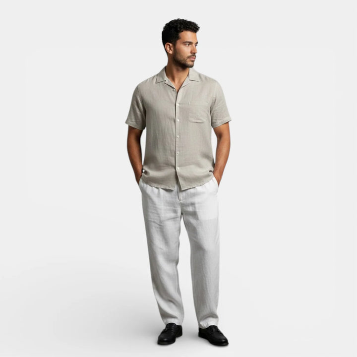 Men's casual short sleeve shirt flat lay showing relaxed fit and button-front styling